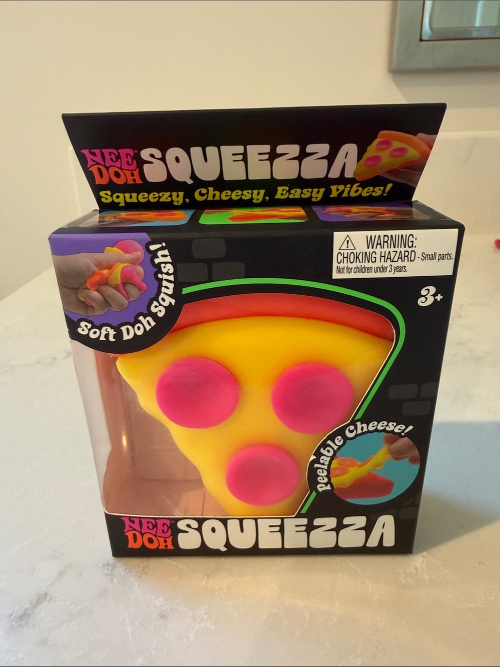 NeeDoh Squeezza Yellow & Pink Pizza Squishy Toy